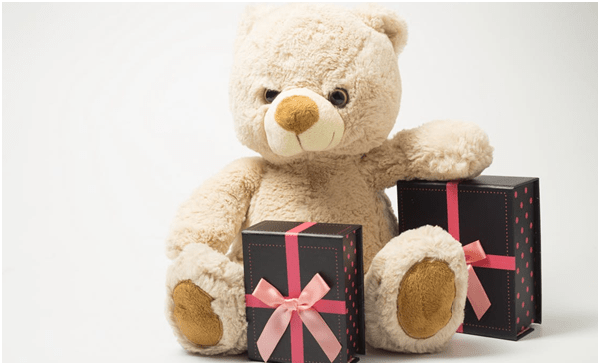 A Gift Hamper With A Teddy Bear